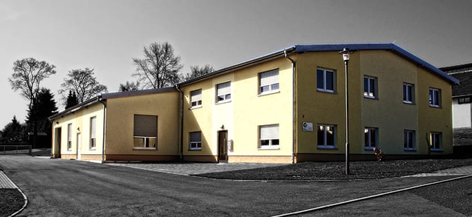 Historische Aufnahme der Druckerei Gutermuth in Grünhainichen — die ersten Generationen der GUMU-Familiengeschichte